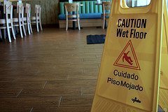Caution slippery when wet sign